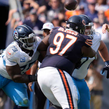 Titans QB Will Levis firest it out before Andrew Billings' pass rush can be a problem in Sunday's Bears win.