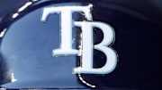 Aug 9, 2022; Milwaukee, Wisconsin, USA;  The Tampa Bay Rays logo on a batting helmet prior to the game against the Milwaukee Brewers at American Family Field. Mandatory Credit: Jeff Hanisch-Imagn Images