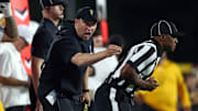Sep 6, 2025; Starkville, Mississippi, USA; Arizona State Sun Devils head coach Kenny Dillingham reacts toward an official during the second quarter against the Mississippi State Bulldogs at Davis Wade Stadium at Scott Field. Mandatory Credit: Petre Thomas-Imagn Images