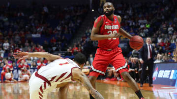 Mar 22, 2019; Tulsa, OK, USA; Ohio State Buckeyes guard Keyshawn Woods (32) dribbles the ball against Iowa State Cyclones guard Nick Weiler-Babb (1) during the first half in the first round of the 2019 NCAA Tournament at BOK Center. Mandatory Credit: Brett Rojo-USA TODAY Sports