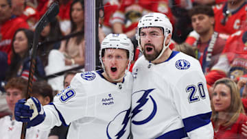 Apr 26, 2025; Sunrise, Florida, USA; Tampa Bay Lightning left wing Nick Paul (20) celebrates with center Jake Guentzel (59) after scoring a goal against the Florida Panthers in the second period during game three of the first round of the 2025 Stanley Cup Playoffs at Amerant Bank Arena. Mandatory Credit: Nathan Ray Seebeck-Imagn Images