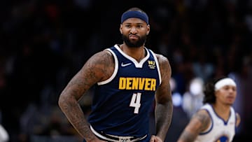 Denver Nuggets center DeMarcus Cousins reacts after a play in the third quarter against the Golden State Warriors.
