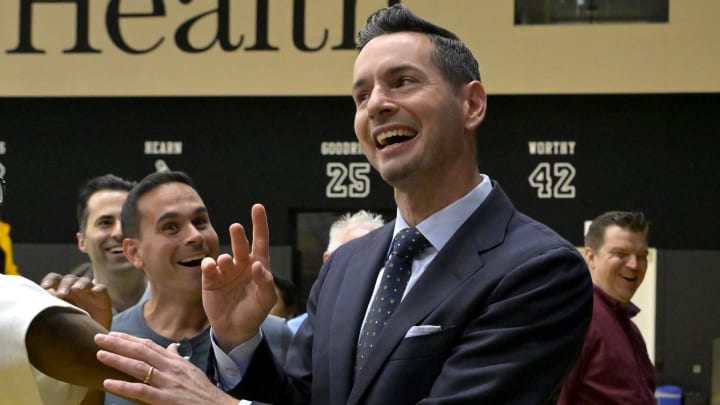 Jun 24, 2024; El Segundo, CA, USA; Los Angeles Lakers head coach JJ Redick laughs with members of the media following his introductory news conference at the UCLA Health Training Center. Mandatory Credit: Jayne Kamin-Oncea-USA TODAY Sports