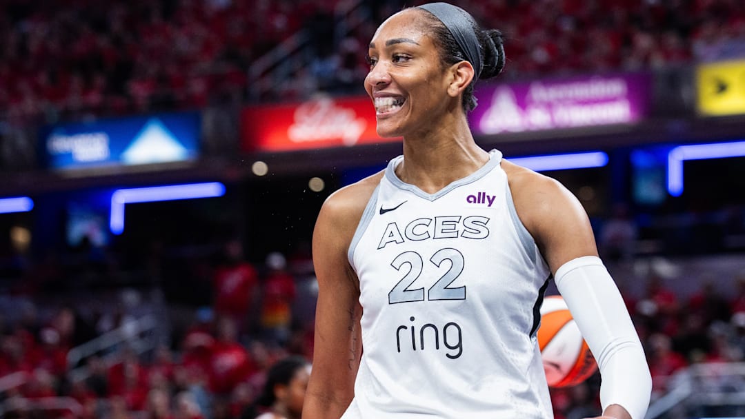 Sep 28, 2025; Indianapolis, Indiana, USA; Las Vegas Aces center A'ja Wilson (22) celebrates a basket in the second half during game four against the Indiana Fever of the second round for the 2025 WNBA Playoffs at Gainbridge Fieldhouse. Mandatory Credit: Trevor Ruszkowski-Imagn Images