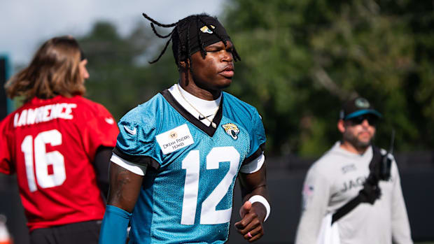 Jacksonville Jaguars wide receiver Travis Hunter (12) jogs to his first drill during the Jacksonville Jaguars’ third mandator