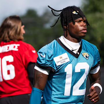 Jacksonville Jaguars wide receiver Travis Hunter (12) jogs to his first drill during the Jacksonville Jaguars’ third mandatory minicamp Thursday June 12, 2025 at the Miller Electric Center in Jacksonville, Fla. [Doug Engle/Florida Times-Union]
