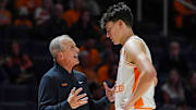 Tennessee coach Rick Barnes speaks with Tennessee forward J.P. Estrella (13) on the sidelines during a NCAA basketball game between Tennessee Volunteers and North Florida Ospreys at Thompson-Boling Arena at Food City Center in Knoxville, Tenn. on Nov. 12, 2025.