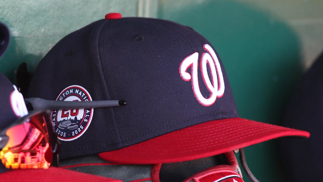 Apr 17, 2025; Pittsburgh, Pennsylvania, USA; Washington Nationals hats and gloves in the dugout against the Pittsburgh Pirates during the sixth inning at PNC Park. 