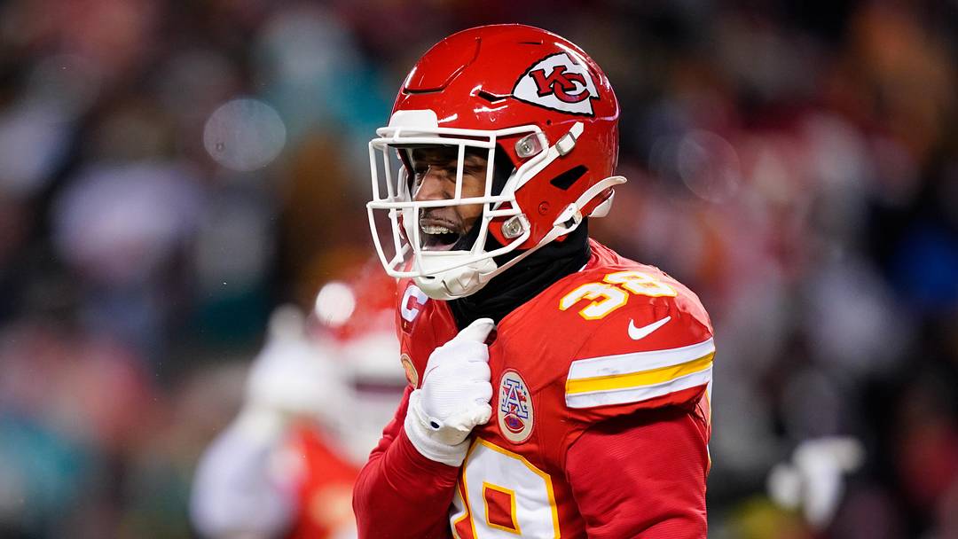 Jan 13, 2024; Kansas City, Missouri, USA; Kansas City Chiefs cornerback L'Jarius Sneed (38) reacts against the Miami Dolphins during the first half of the 2024 AFC wild card game at GEHA Field at Arrowhead Stadium. Mandatory Credit: Jay Biggerstaff-Imagn Images