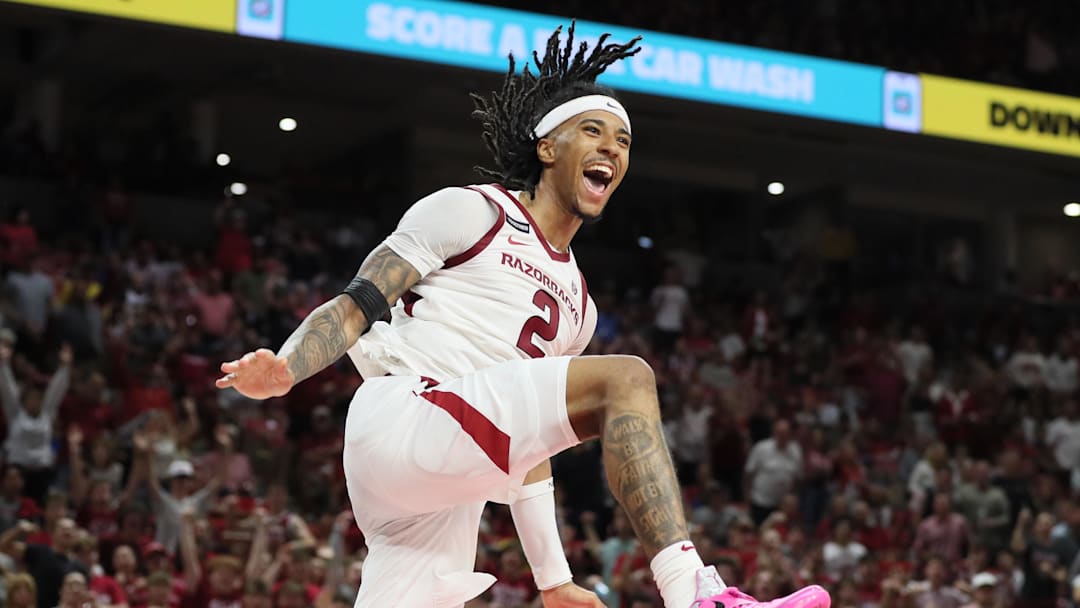 Oct 25, 2024; Fayetteville, AR, USA; Arkansas Razorbacks guard Boogie Fland (2) celebrates after scoring in the second half against the Kansas Jayhawks at Bud Walton Arena.