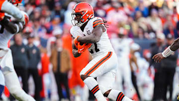 Nov 26, 2023; Denver, Colorado, USA; Cleveland Browns running back Kareem Hunt (27) carries the ball in the second quarter against the Denver Broncos at Empower Field at Mile High.