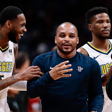 Mar 15, 2018; Denver, CO, USA; Detroit Pistons guard Jameer Nelson (41) greets Denver Nuggets forward Will Barton (5) after the game at the Pepsi Center. Mandatory Credit: Isaiah J. Downing-Imagn Images