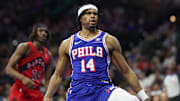 Mar 30, 2025; Philadelphia, Pennsylvania, USA; Philadelphia 76ers guard Ricky Council IV (14) reacts after dunking the ball against the Toronto Raptors during the second quarter at Wells Fargo Center. Mandatory Credit: Bill Streicher-Imagn Images