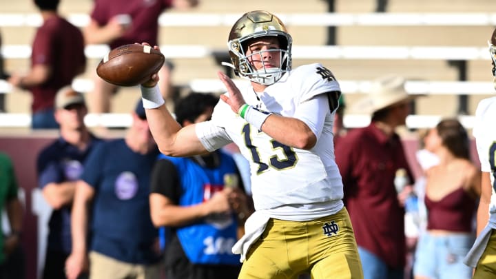 Aug 31, 2024; College Station, Texas, USA; Notre Dame Fighting Irish quarterback Riley Leonard (13) warms up prior to the game against the Texas A&M Aggies at Kyle Field. 