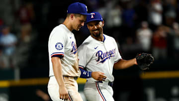 Jul 22, 2025; Arlington, Texas, USA;  Texas Rangers shortstop Corey Seager (5) celebrates with Texas Rangers second baseman Marcus Semien (2) after the game against the Athletics at Globe Life Field. Mandatory Credit: Kevin Jairaj-Imagn Images