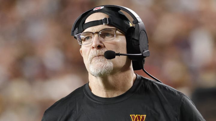 Dec 29, 2024; Landover, Maryland, USA; Washington Commanders head coach Dan Quinn looks on from the sidelines against the Atlanta Falcons during the second half at Northwest Stadium. Mandatory Credit: Amber Searls-Imagn Images