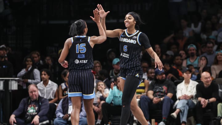 Chicago Sky forward Angel Reese celebrates with guard Lindsay Allen 