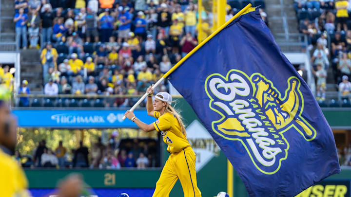 Savannah Banana pitcher Dakota Albritton waves a Bananas flag during the Savannah Bananas game against the Texas Tailgaters Saturday, Aug. 30, 2025 at PNC Park in Pittsburgh, Pa.