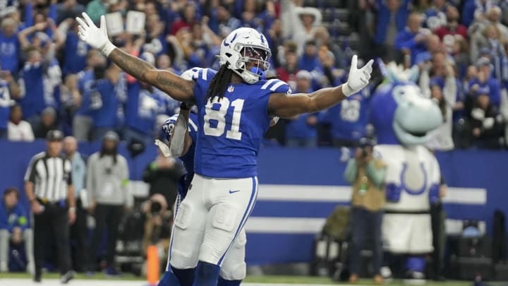 Jan 6, 2024; Indianapolis, Indiana, USA; Indianapolis Colts tight end Mo Alie-Cox (81) reacts after making a catch for a two-point conversion against the Houston Texans at Lucas Oil Stadium. Mandatory Credit: Jenna Watson-USA TODAY Sports