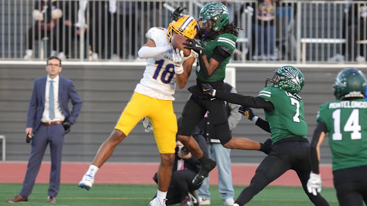 Grant sophomore Zo Edwards goes up high to haul in one of three catches he had Friday for 62 yards and a touchdown in the Pacers' 35-28 win over Oxnard Pacifica for the CIF State D2-AA championship at Saddleback College in Mission Viejo on Dec. 13, 2024. Grant sophomore Zo Edwards goes up high to haul in one of three catches he had Friday for 62 yards and a touchdown in the Pacers' 35-28 win over Oxnard Pacifica for the CIF State D2-AA championship at Saddleback College in Mission Viejo on Dec. 13, 2024.