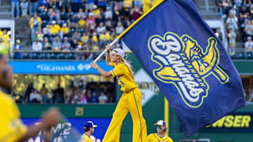 Savannah Banana pitcher Dakota Albritton waves a Bananas flag during the Savannah Bananas game against the Texas Tailgaters Saturday, Aug. 30, 2025 at PNC Park in Pittsburgh, Pa.