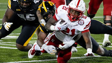 Nebraska running back Emmett Johnson is tackled during last year's Nebraska-Iowa game in Iowa City.