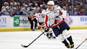 Jan 6, 2025; Buffalo, New York, USA;  Washington Capitals left wing Alex Ovechkin (8) skates with the puck during the third period against the Buffalo Sabres at KeyBank Center. Mandatory Credit: Timothy T. Ludwig-Imagn Images