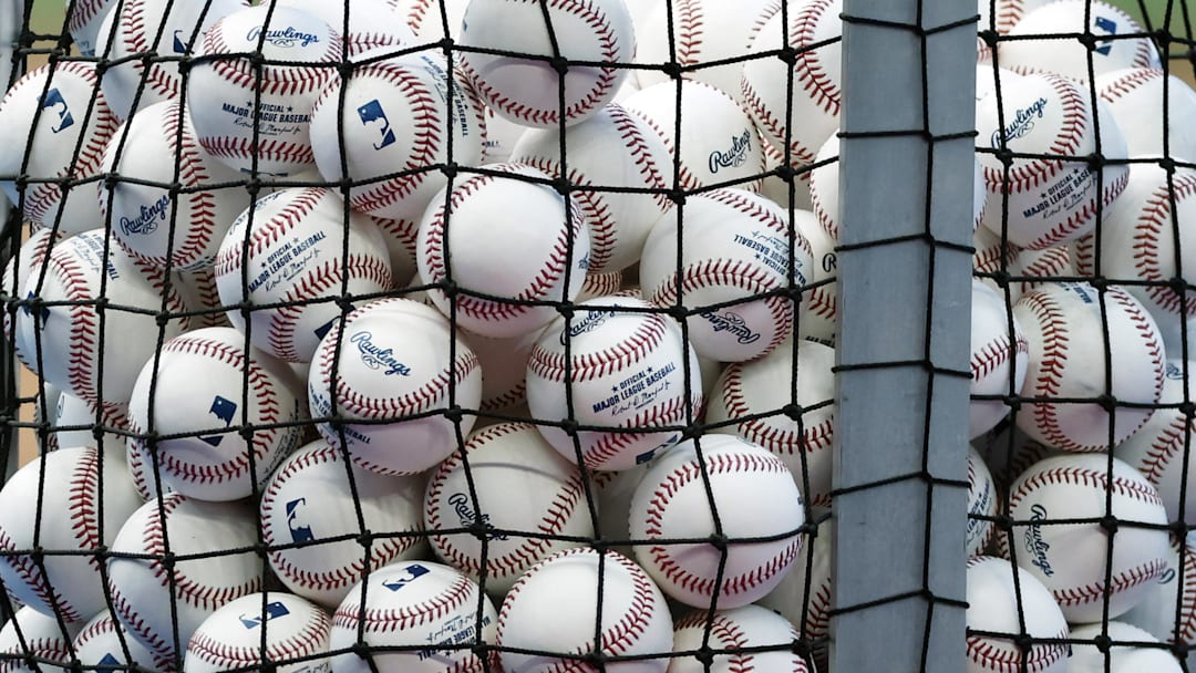 Apr 16, 2024; Miami, Florida, USA;  A bucket of baseballs sits on the field prior to the game between the San Francisco Giants against the Miami Marlins at loanDepot Park. Mandatory Credit: Rhona Wise-Imagn Images