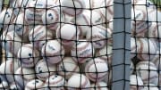 Apr 16, 2024; Miami, Florida, USA;  A bucket of baseballs sits on the field prior to the game between the San Francisco Giants against the Miami Marlins at loanDepot Park. Mandatory Credit: Rhona Wise-USA TODAY Sports