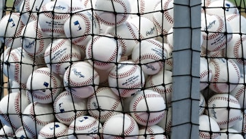 Apr 16, 2024; Miami, Florida, USA;  A bucket of baseballs sits on the field prior to the game between the San Francisco Giants against the Miami Marlins at loanDepot Park. Mandatory Credit: Rhona Wise-Imagn Images