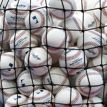 Apr 16, 2024; Miami, Florida, USA;  A bucket of baseballs sits on the field prior to the game between the San Francisco Giants against the Miami Marlins at loanDepot Park. Mandatory Credit: Rhona Wise-Imagn Images