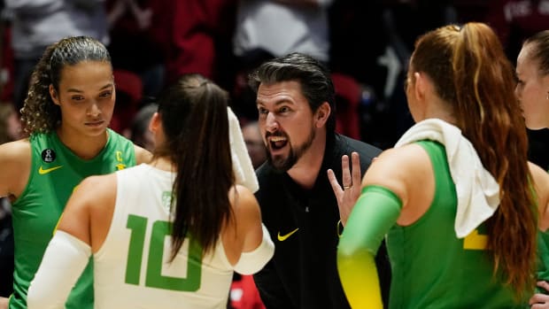 Oregon Head Coach Matt Ulmer is seen during a time out in the second set of the NCAA Regional Volleyball Finals 