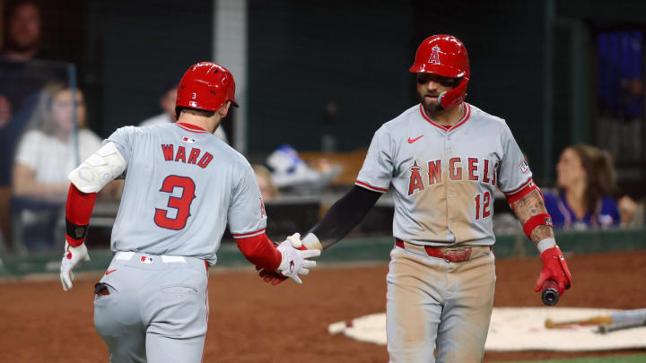 May 17, 2024; Arlington, Texas, USA;  Los Angeles Angels left fielder Taylor Ward (3) is congratulated by center fielder Kevin Pillar (12) after hitting a home run in the sixth inning against the Texas Rangers at Globe Life Field. Mandatory Credit: Tim Heitman-USA TODAY Sports