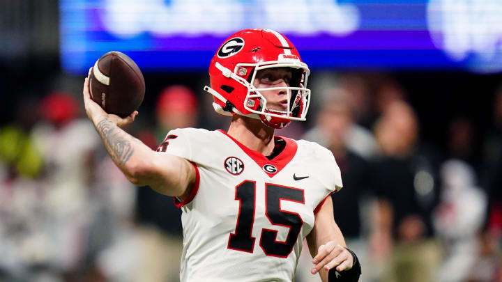 Dec 2, 2023; Atlanta, GA, USA;  Georgia Bulldogs quarterback Carson Beck (15) throws a pass against the Alabama Crimson Tide in the third quarter of the SEC Championship at Mercedes-Benz Stadium. Mandatory Credit: John David Mercer-USA TODAY Sports