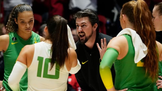 Oregon Head Coach Matt Ulmer is seen during a time out in the second set of the NCAA Regional Volleyball Finals 