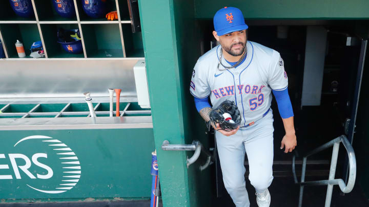 Jul 7, 2024; Pittsburgh, Pennsylvania, USA;  New York Mets starting pitcher Sean Manaea (59) enters the dugout before pitching against the Pittsburgh Pirates at PNC Park. Mandatory Credit: Charles LeClaire-USA TODAY Sports