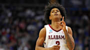 Mar 27, 2025; Newark, NJ, USA; Alabama Crimson Tide guard Aden Holloway (2) celebrates making a three pointer during the second half against the Brigham Young Cougars during an East Regional semifinal of the 2025 NCAA tournament at Prudential Center.