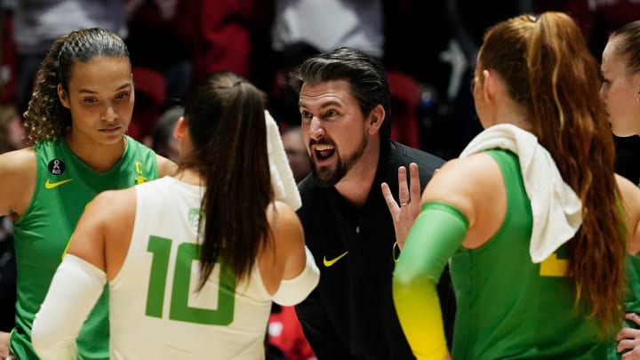 Oregon Head Coach Matt Ulmer is seen during a time out in the second set of the NCAA Regional Volleyball Finals match against Wisconsin on Saturday December 9, 2023 at the UW Field House in Madison, Wis.