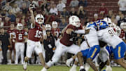 Sep 27, 2025; Stanford, California, USA;  Stanford Cardinal quarterback Ben Gulbranson (15) throws the football during the fourth quarter against the San Jose State Spartans at Stanford Stadium. Mandatory Credit: Stan Szeto-Imagn Images