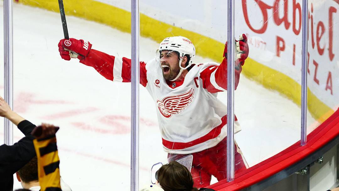 Feb 26, 2026; Ottawa, Ontario, CAN; Detroit Red Wings center Dylan Larkin (71) celebrates after scoring in overtime against the Ottawa Senators at Canadian Tire Centre. Mandatory Credit: Keito Newman-Imagn Images