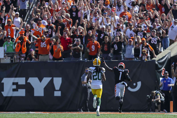 Cincinnati Bengals wide receiver Ja'Marr Chase (1) runs the ball in for a touchdown against the Green Bay Packers in 2021.