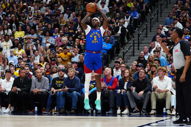 Denver Nuggets guard Kentavious Caldwell-Pope shoots the ball in the 2024 NBA playoffs.