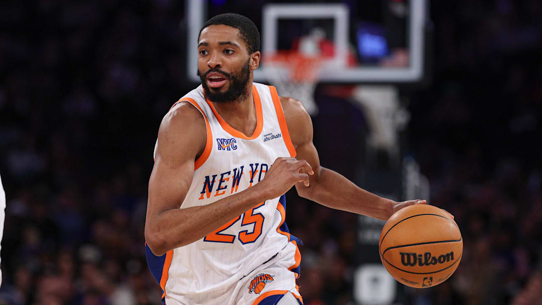 Mar 22, 2025; New York, New York, USA; New York Knicks forward Mikal Bridges (25) dribbles up court during the first half against the Washington Wizards at Madison Square Garden. Mandatory Credit: Vincent Carchietta-Imagn Images