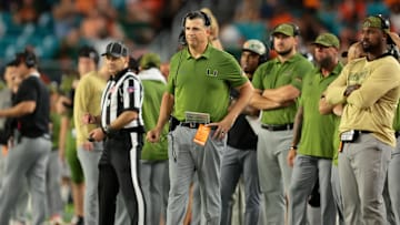 Oct 25, 2025; Miami Gardens, Florida, USA; Miami Hurricanes head coach Mario Cristobal watches from the sideline against the Stanford Cardinal during the fourth quarter at Hard Rock Stadium. Mandatory Credit: Sam Navarro-Imagn Images