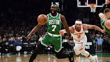 Feb 23, 2025; Boston, Massachusetts, USA;  Boston Celtics guard Jaylen Brown (7) loses the ball in front of New York Knicks guard Josh Hart (3) during the second half at TD Garden. Mandatory Credit: Bob DeChiara-Imagn Images