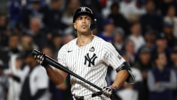Oct 29, 2024; Bronx, New York, USA; New York Yankees designated hitter Giancarlo Stanton (27) reacts after striking out against the Los Angeles Dodgers in the fifth inning during game four of the 2024 MLB World Series at Yankee Stadium. Mandatory Credit: Vincent Carchietta-Imagn Images