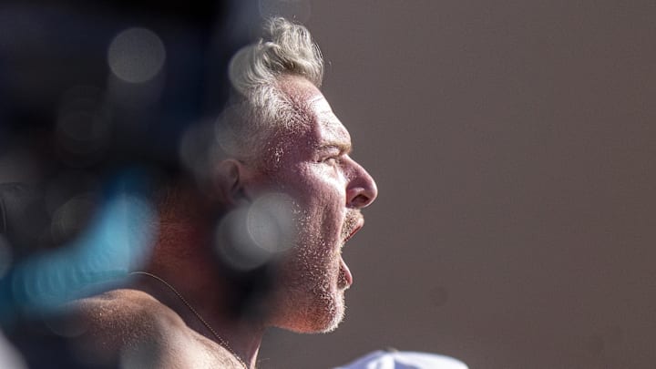 Oct 26, 2024; Bloomington, Indiana, USA; ESPN College GameDay host and former Indianapolis Colts punter Pat McAfee takes his shirt off for the camera during the second quarter of a game between the Washington Huskies and Indiana Hoosiers at Memorial Stadium. Mandatory Credit: Jacob Musselman-Imagn Images Oct 26, 2024; Bloomington, Indiana, USA; ESPN College GameDay host and former Indianapolis Colts punter Pat McAfee takes his shirt off for the camera during the second quarter of a game between the Washington Huskies and Indiana Hoosiers at Memorial Stadium. Mandatory Credit: Jacob Musselman-Imagn Images