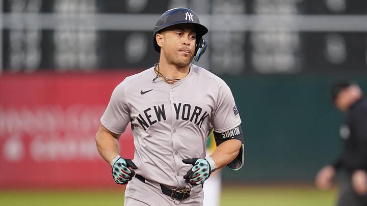 Sep 21, 2024; Oakland, California, USA; New York Yankees designated hitter Giancarlo Stanton (27) prepares to round third base after hitting a three-run home run against the Oakland Athletics in the third inning at the Oakland-Alameda County Coliseum. Mandatory Credit: Cary Edmondson-Imagn Images