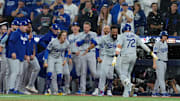 Dodgers second baseman Miguel Rojas reacts after hitting a game-tying home run in the ninth inning of Game 7 in the 2025 World Series.