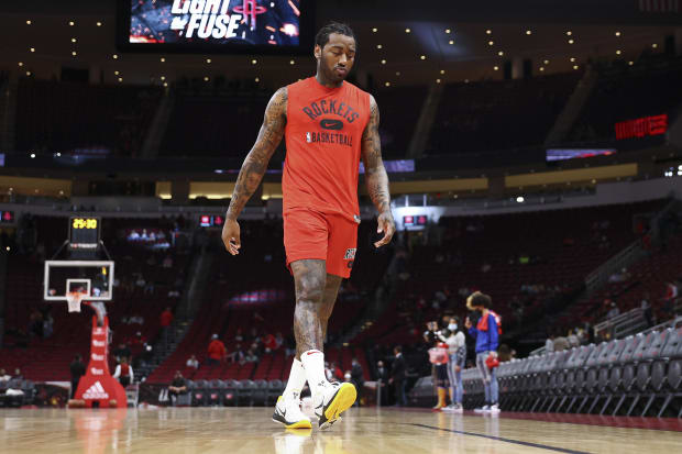 Houston Rockets guard John Wall (1) walks on the court before the game against the Chicago Bulls. 